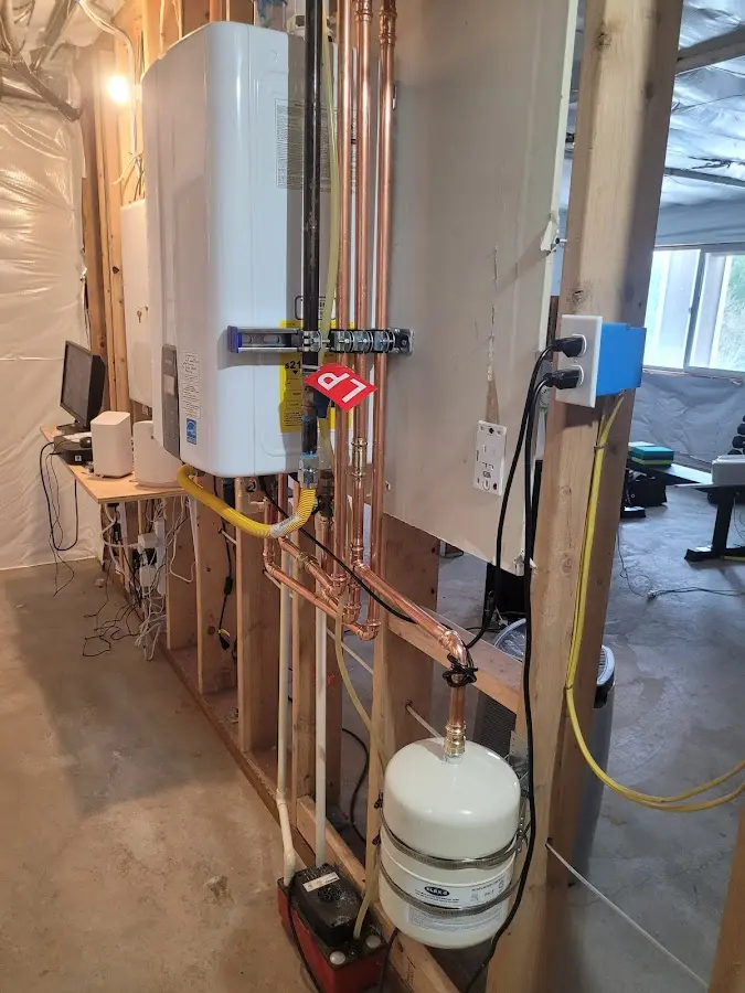 Licensed plumber repairing a kitchen sink in Vidor